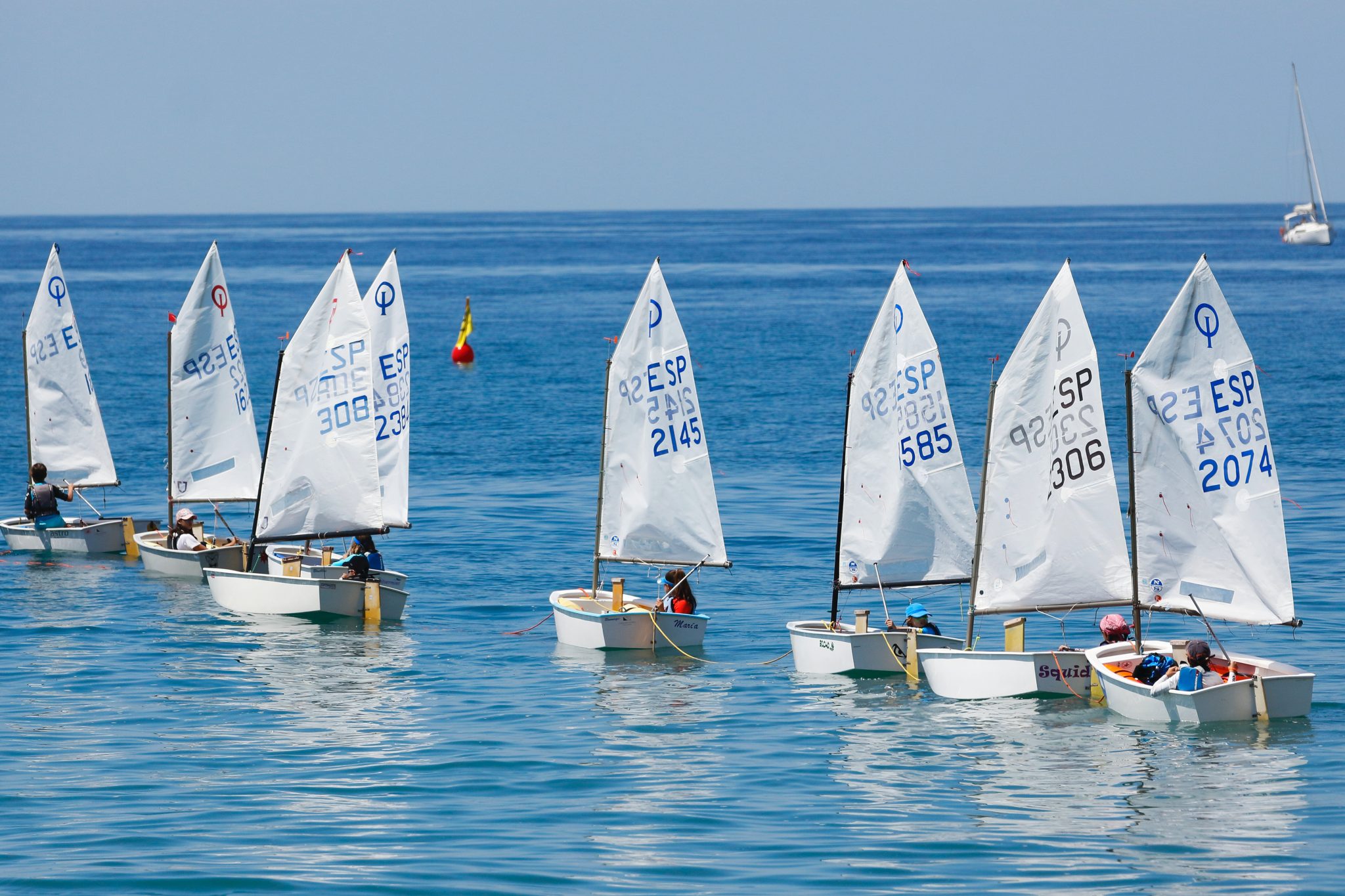 gray boats sailing during daytime