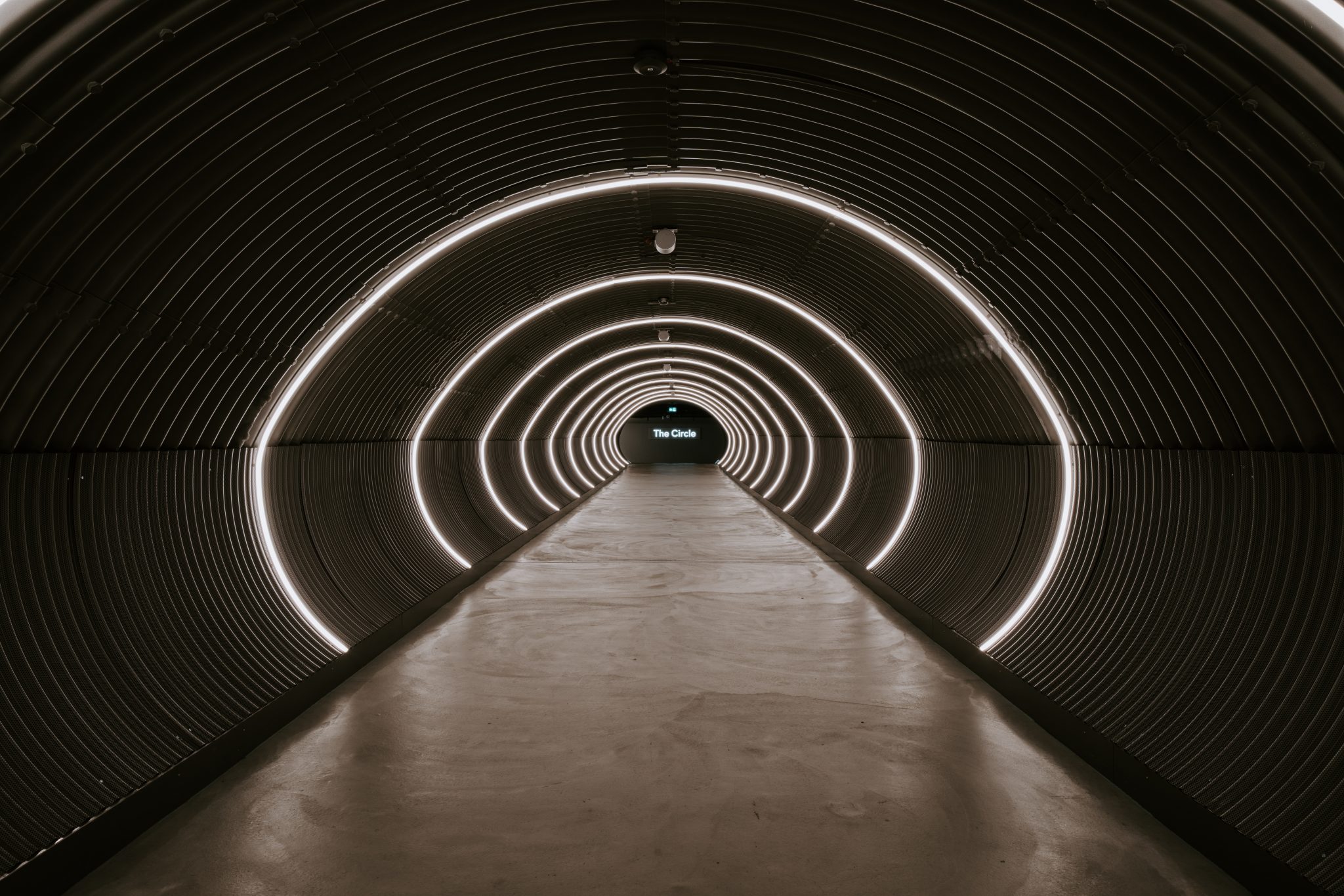 brown wooden tunnel with light
