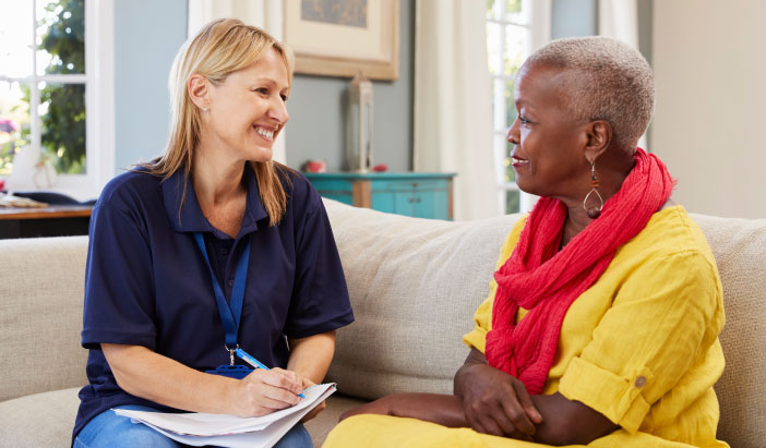 TPI-SocialServices Social worker with patient